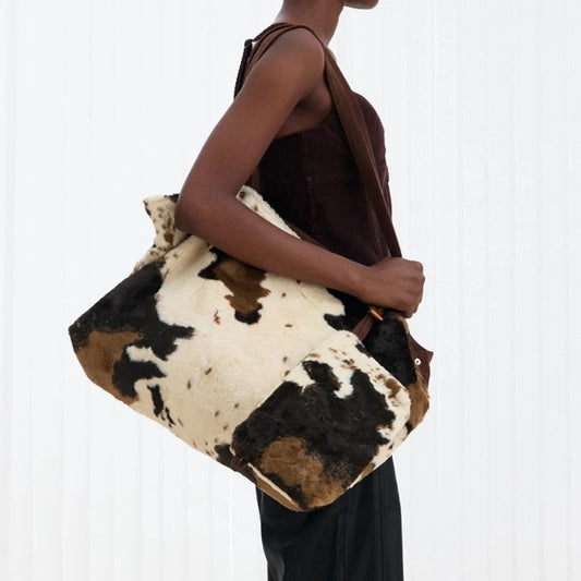 Cow Print Plush Tote – That Fluffy Bag Everyone Wants